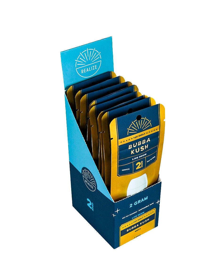 Realize Top Shelf Bubba Kush 2 gram disposable vape retail display featuring gold and navy packaging with live resin THC blend branding.